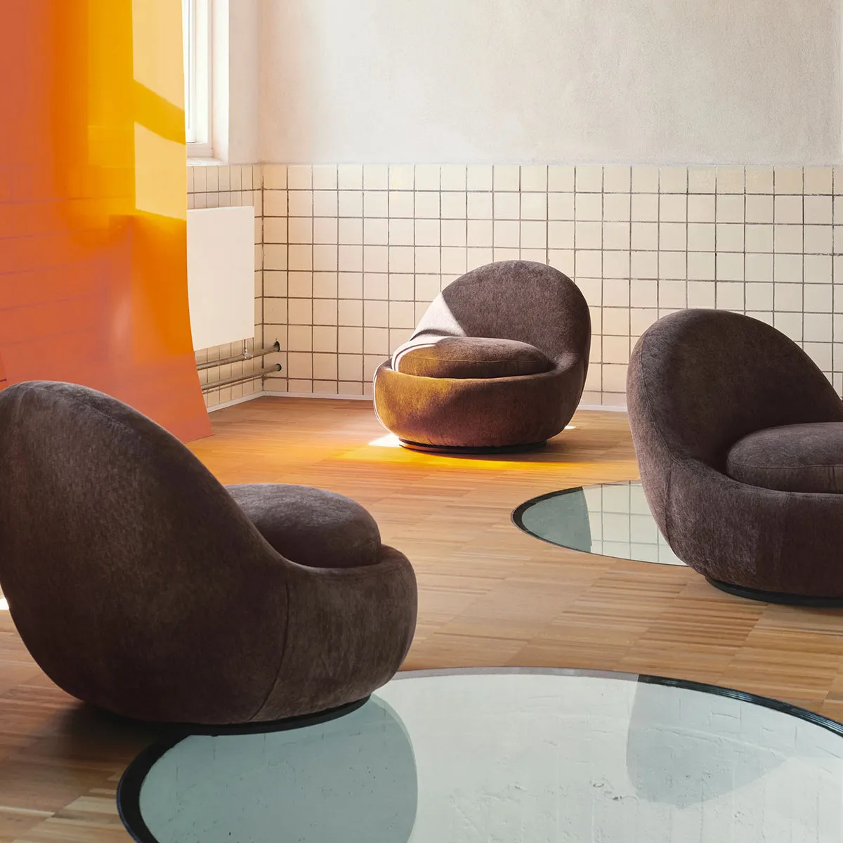 Babette Fabric Swivel Armchair