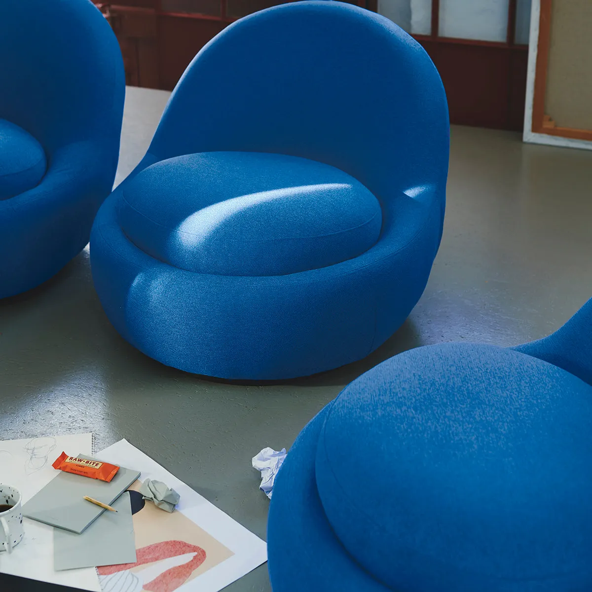 Babette Fabric Swivel Armchair