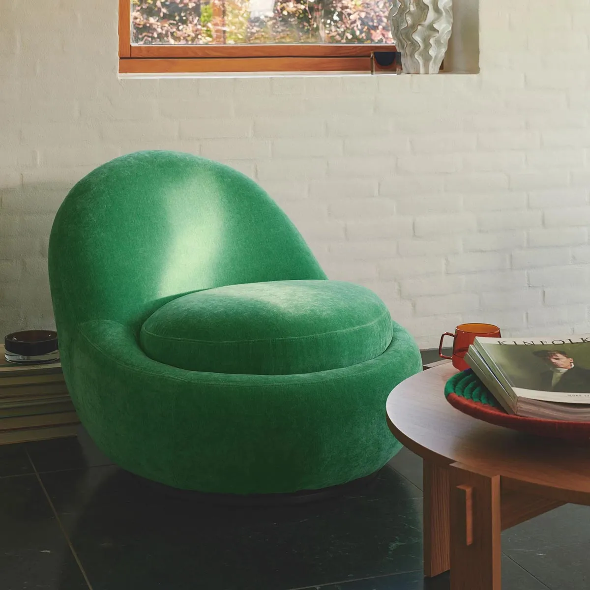 Babette Fabric Swivel Armchair