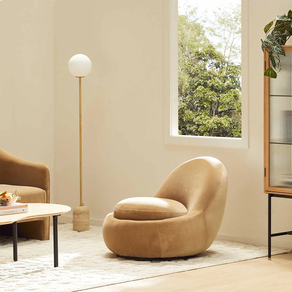 Babette Velvet Swivel Armchair